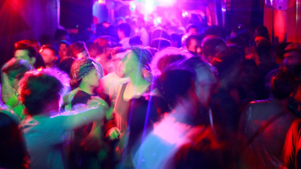 Blurred image of packed dance floor