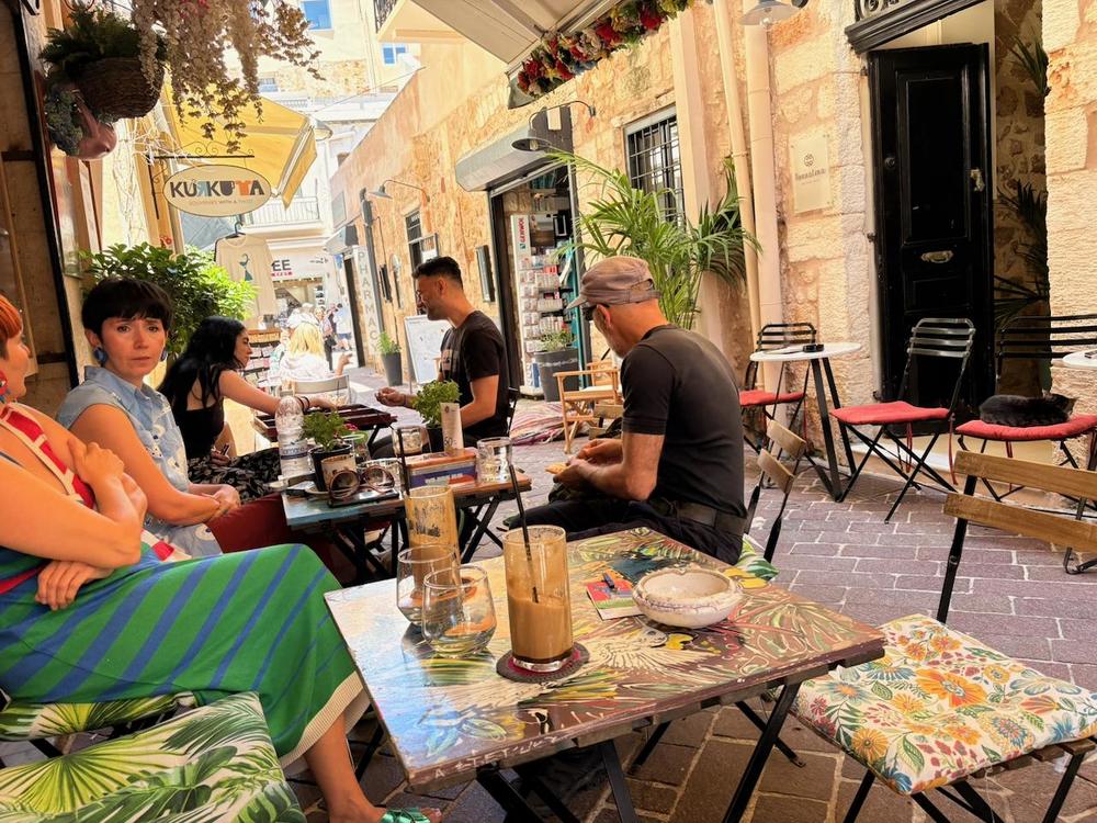 The cafe is near the harbour but not part of the tourist chaos